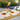 Marimekko utendørsteppe, Unikko Anniversary Honey 433001 – produkt- og miljøbilde 4